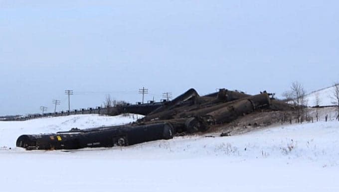 Crude in the air': Oil carrying train derails near western Manitoba village